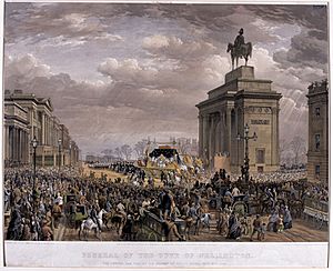 Funeral of the Duke of Wellington. The funeral car passing the archway at Apsley House, 18 November 1852 22931