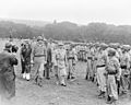 Photograph of President Truman walking past members of the Nisei 442nd Regimental Combat Team as they stand at... - NARA - 199390