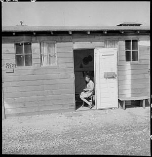 San Bruno, California. Barrack home in one of the long lines of converted horse stalls. Each famil . . . - NARA - 537897