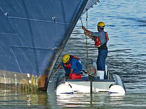 Cleaning the hull 3