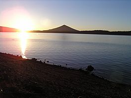 Sunrise over Crescent Lake with Odell Butte in skyline.