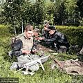 Estonian forest brothers relaxing and cleaning their guns after a shooting exercise in Veskiaru, Järva County, Estonia, 1953. (47953893422)