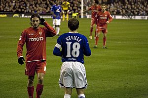 Pablo Daniel Osvaldo with Phil Neville