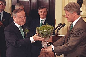 President Clinton receives a crystal bowl of shamrocks from Irish Prime Minister Albert Reynolds on St. Patrick's Day