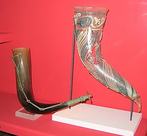 Vendel-era bronze horn fittings and glass drinking horn (Swedish Museum of National Antiquities)