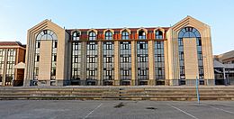 Druga Gimnazija Kragujevac - Veroljub Atanasijevic Arhitect 1997, detail of the facade, rear facade.jpg