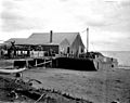 Wharf and scows at unidentified cannery, Nushagak, Alaska,1917 (COBB 104)