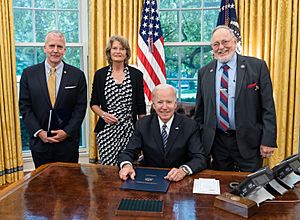 President Joe Biden signs the Alaska Tourism Restoration Act into law