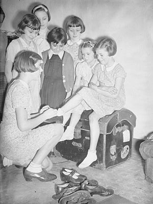 Channel Island Evacuees Try on American Clothing in Marple, Cheshire, England, 1940 D742