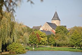 The lake and the church of Sainte-Corneille and Saint-Cyprien