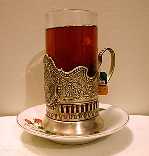 Podstakannik and glass of tea