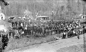 Item SGN 341 - (Bishop Durieu, Father Le Jeune, and the Very Rev. J.M. Fayard with a large group of Native Indians outside the Roman Catholic Church at North Bend, B.C.)