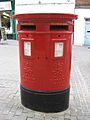 Double postbox with two apertures, one for stamped, and the other for franked, mail