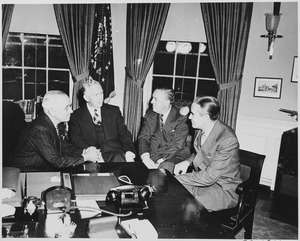 L to R, President Truman, George Marshall, Paul Hoffman, and Averell Harriman, in the oval office discussing the... - NARA - 200036
