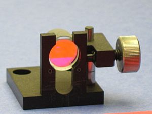 Laserr mirror from a dye laser for use with rhodamine