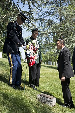 A ceremony honoring Hmong and Lao combat veterans at the memorial tree and plaque in Arlington National Cemetery (17068944794)