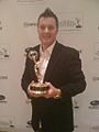 Charlie Moore with Emmy Award