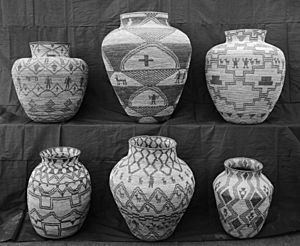 A collection of Apache Indian baskets (ollas) on display, ca.1900 (CHS-3555)
