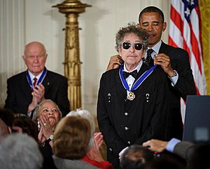 President Barack Obama presents American musician Bob Dylan with a Medal of Freedom