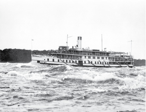 Passenger vessel Rapids Prince transits the Long Sault Rapids, near Cornwall, on the St. Lawrence River.