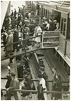 Disembarking South Steyne, Sydney, 1940 - attributed to Dennis Rowe (6184464208)