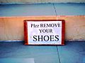 PLZZ REMOVE YOUR SHOES. Sign at entrance to stupa. Nubra, India