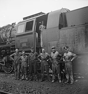 American and British railroad crews who are taking supplies for Russia. Somewhere in Iran