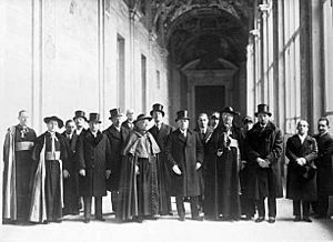 Group of Vatican and Italian government notables posing at the Lateran Palace before the signing of the treaty