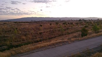 Arroyo Mocho with Pleasanton Ridge and Hangar One Blimp.jpg