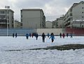 Baotou students playing soccer in snow