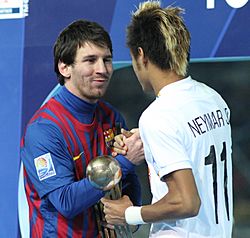 Lionel Messi and Neymar shake hands after the 2011 FIFA Club World Cup Final.