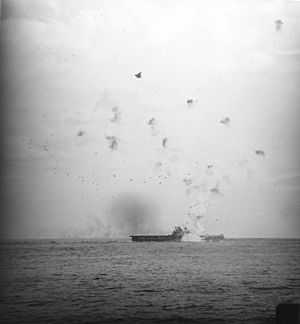 USS Enterprise (CV-6) hit by kamikaze on 21 May 1945 (80-G-323565)