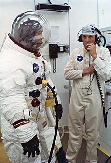 Apollo 13 Haise suits up