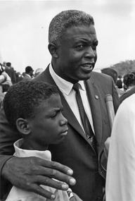 Civil Rights March on Washington, D.C. (Former National Baseball League player, Jackie Robinson with his son.) - NARA - 542024