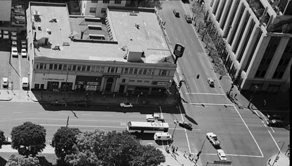 View to south from city hall tower to the SE corner First and Spring, c.1980s