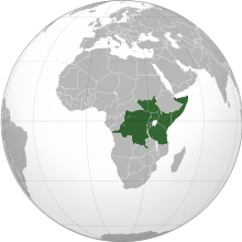 An orthographic map projection of the world, highlighting the East African Community's member states (green), Somalia joined in 2023