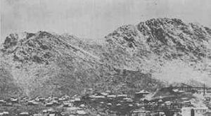 The town of Weaver in 1888. Rich Hill is in the background.