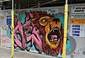 Graffiti in Shoreditch, London - Lion in Brick Lane (13784222033)