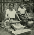 Woman and girl in el salvador making bread
