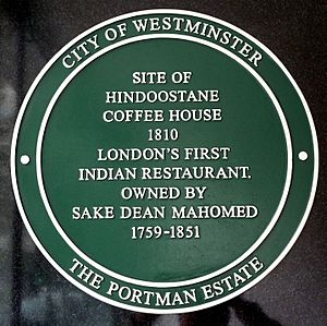 Plaque reads: Site of Hindoostane Coffee House – 1810 – London's first Indian restaurant – Owned by Sake Dean Mahomed 1759–1851