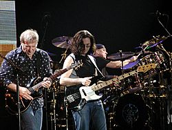 Alex Lifeson, Geddy Lee, and Neil Peart of Rush30th Anniversary tour photo, 2004