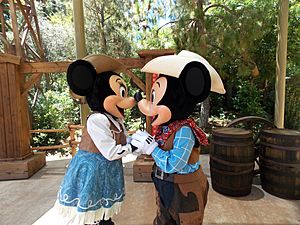 Disneyland Mickey and Minnie kiss as cowboys.jpg