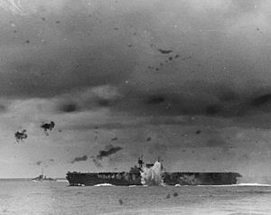 Japanese bomb explodes off the port side of USS Enterprise (CV-6) during the Battle of the Santa Cruz Islands on 26 October 1942 (80-G-30198)