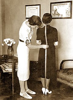 A tailor fitting a customer (Belgrade, 1937)