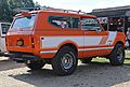 IH Scout II Rallye in orange, rear right (at Balsam Farms)