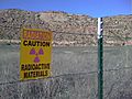 "Caution- Radioactive Materials" sign at Uravan townsite near San Miguel River, Colorado