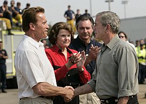GW. Bush shakes hands with A. Schwarzenegger, Oct. 25, 2007