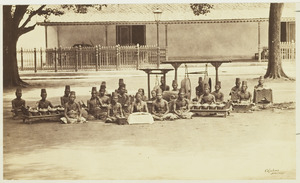 KITLV 3930 - Kassian Céphas - A Dalang, a pesinden and nijaga with a gamelan in the Kraton of the Sultan of Yogyakarta - Around 1885