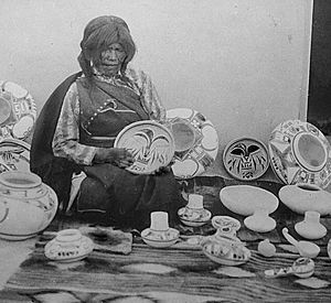 Nampeyo, Hopi pottery maker, seated, with examples of her work, cropped.jpg