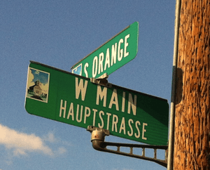 Bilingual street sign in Fredricksburg Texas